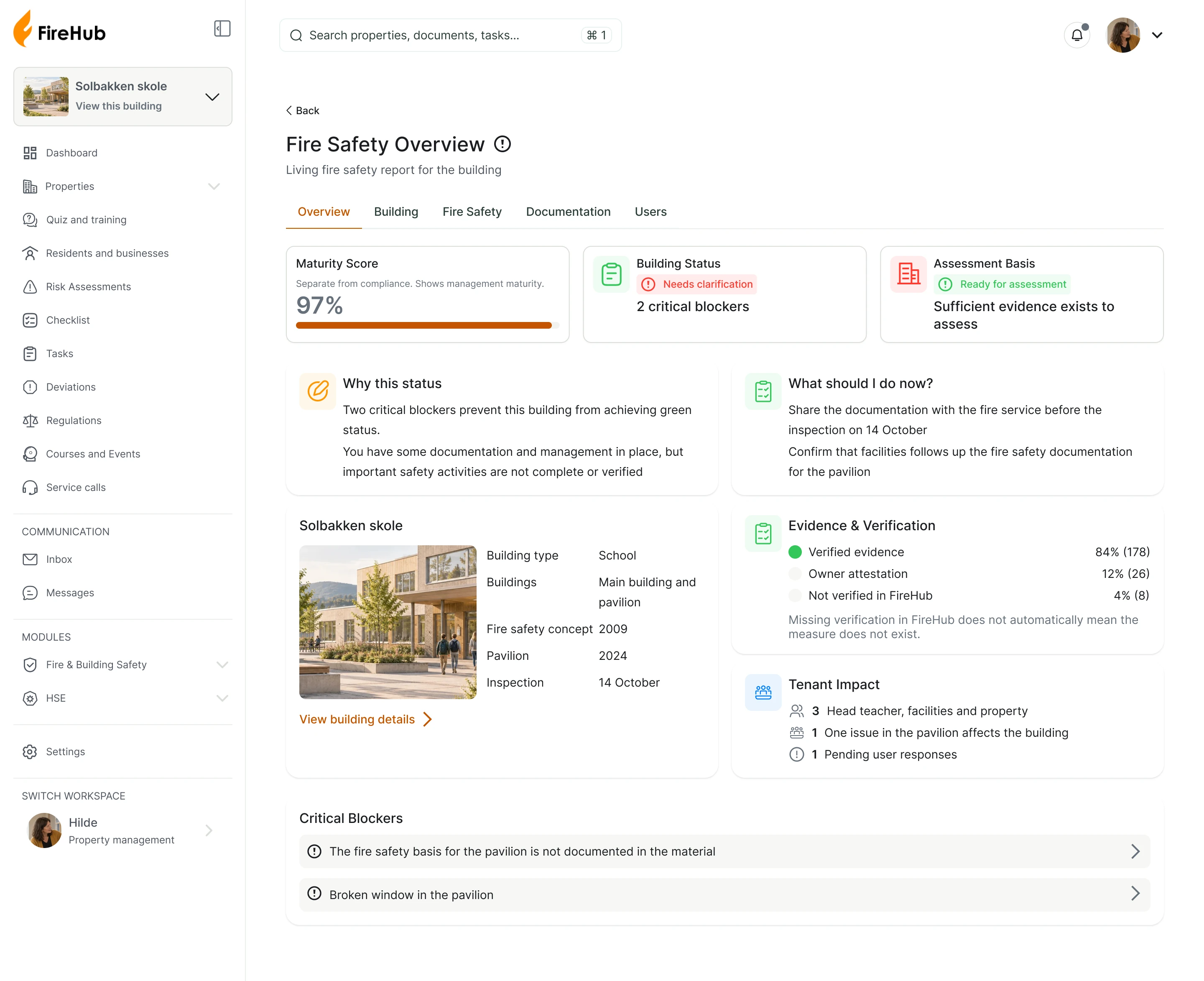 Screenshot of FireHub on a computer: the fire safety overview for Solbakken skole, with maturity score, status, what should be done now and two critical blockers.